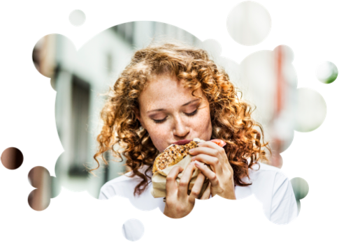 young-woman-eating-sandwich